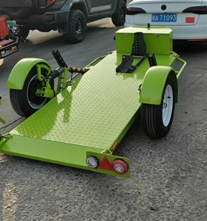 Przyczepa motocyklowa Model 100 z podnośnikiem hydraulicznym i podnośnikiem pół-spadowym